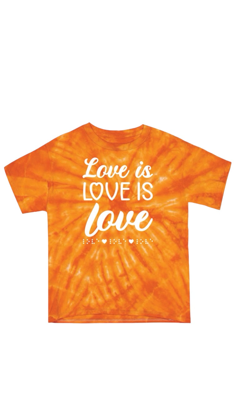 “Love is love is love” t-shirt with colorful sunny orange tie dye. The shirt has 3D puff print ink reading LOVE IS LOVE IS LOVE stacked one above the other in two beautiful fonts, complete with 3D tactile braille underneath the font.