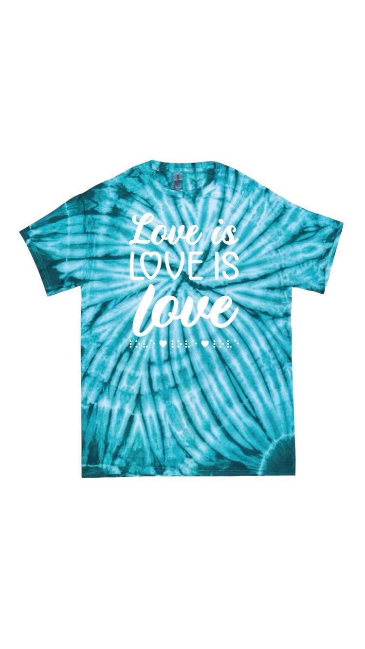  t-shirt with colorful tones of teal tie dye. The shirt has 3D puff print ink reading LOVE IS LOVE IS LOVE stacked one above the other in two beautiful fonts, complete with 3D tactile braille underneath the font. 