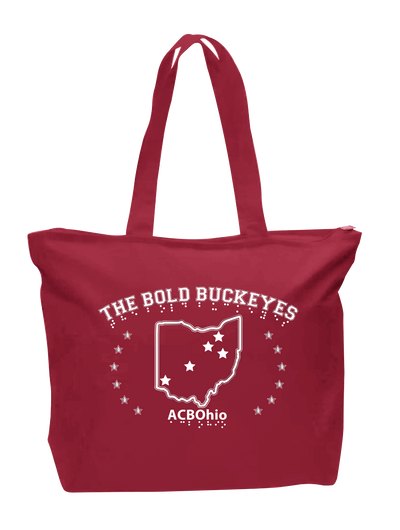 This red canvas tote is 15 by 18. There is a fold in the bottom of the bag so that the bag can sit upright. It has a full zip across the top as well as a zippered pocket inside. The print features the outline of the state of Ohio with six stars in a half circle on either side. There are five stars within the state outline marking cities within Ohio. Above the stars and state outline reads THE BOLD BUCKEYES with braille under each letter. Under the state and stars is ACB OHIO with braille under each letter.
