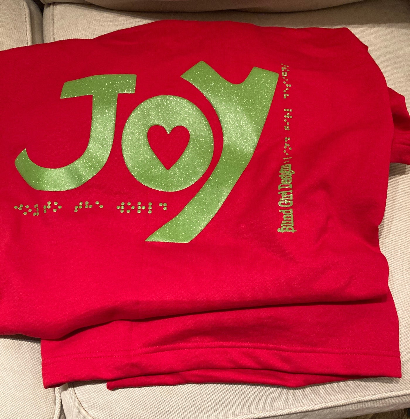 Tactile “Joy” in Green Ink Sweatshirt Blanket - Red