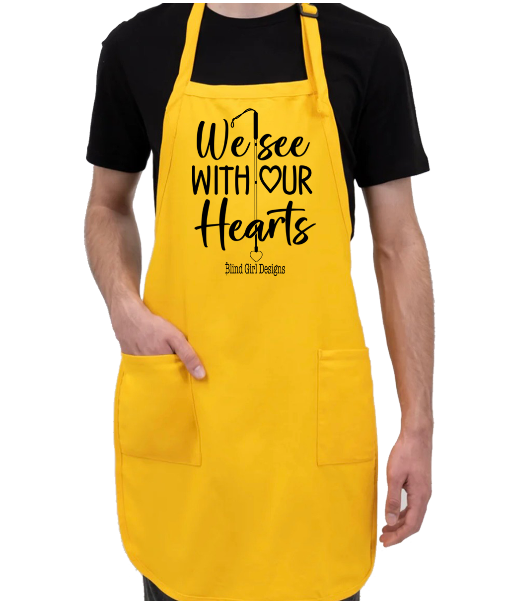 We See With Our Hearts whitecane  apron bright yellow