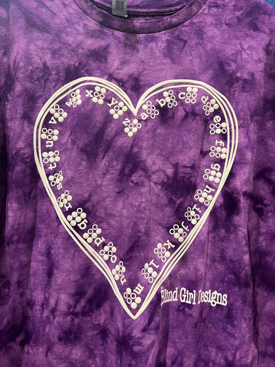 This dark and light purple tie-dye shirt features the Braille ABCs lining the inside of a hand-drawn heart. It has both the letters and the letters in Braille, which forms a beautiful pattern! It's printed in our puff ink so that it is tactile!